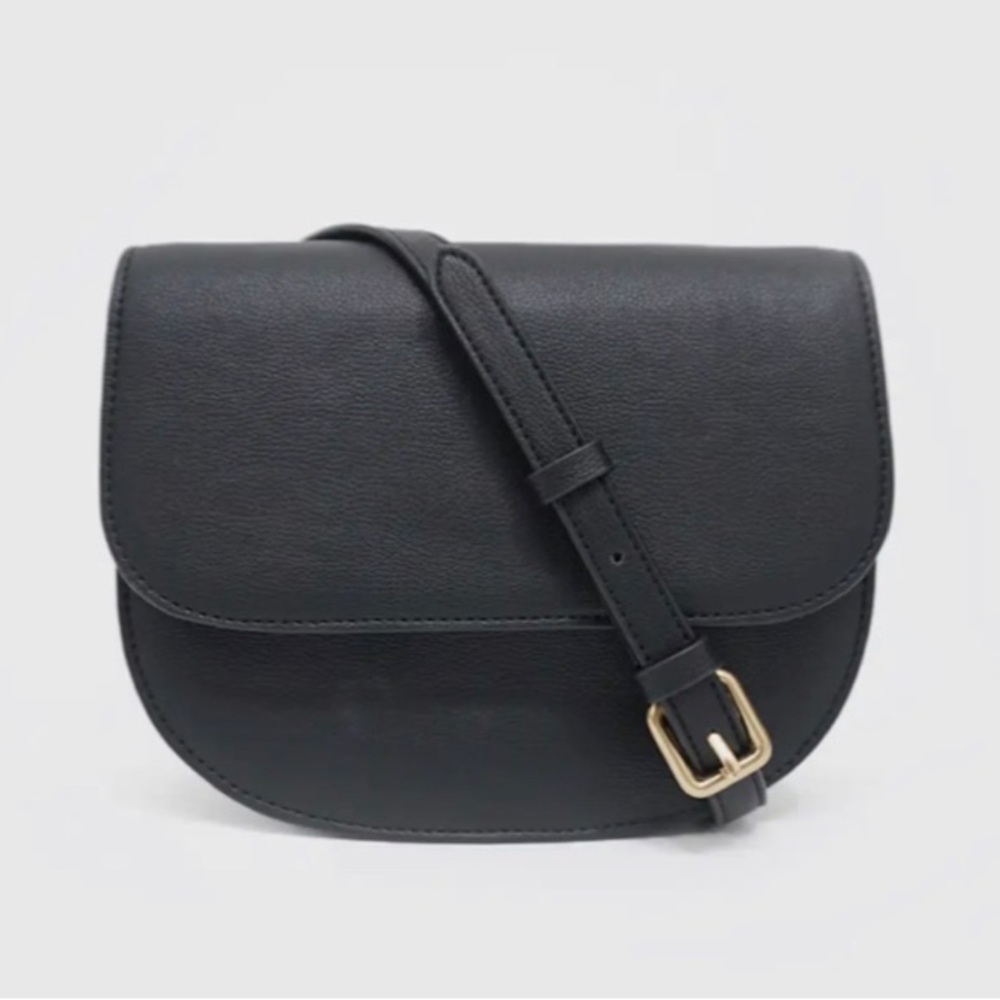 Quince black vegan leather saddle bag